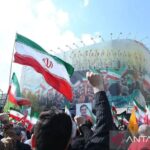 Warga Teheran turun ke jalan dukung pemerintah Iran. Foto Antara