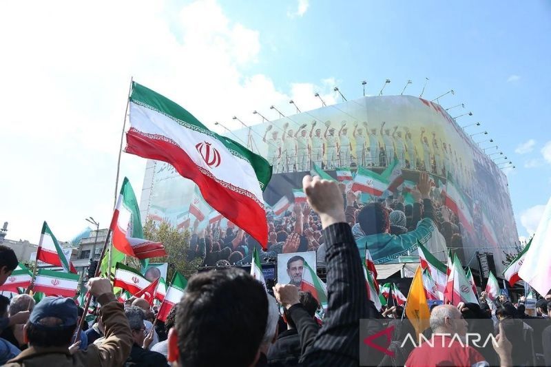 Warga Teheran turun ke jalan dukung pemerintah Iran. Foto Antara