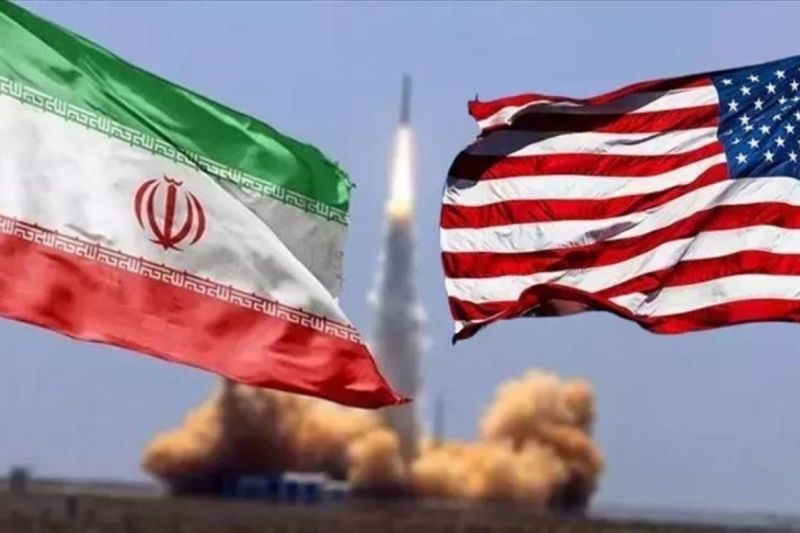 Ilustrasi bendera AS-Iran dan peluru kendali. Foto Antara Ilustrasi bendera AS-Iran dan peluru kendali. Foto Antara