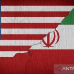 Ilustrasi bendera AS dan Iran. Foto Antara
