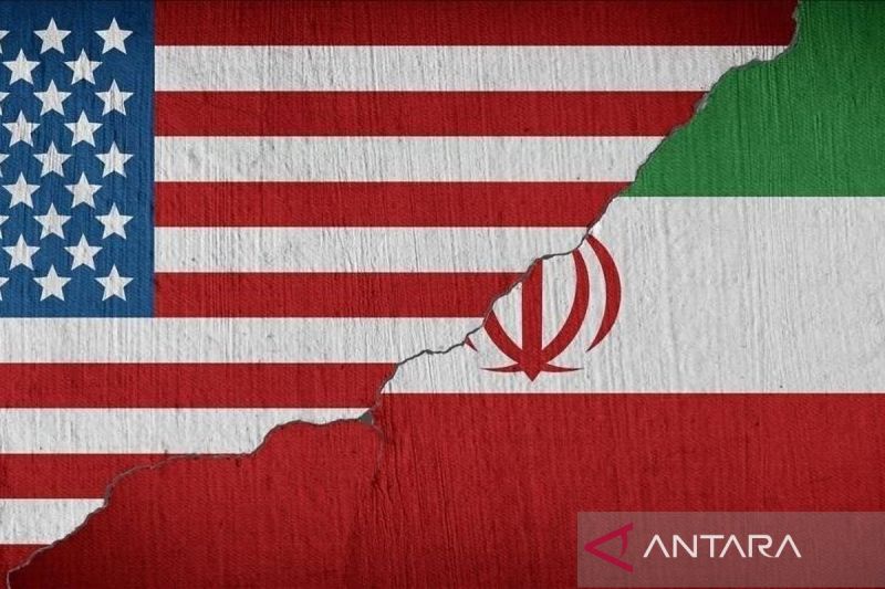 Ilustrasi bendera AS dan Iran. Foto Antara Ilustrasi bendera AS dan Iran. Foto Antara