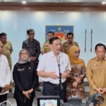 Chairman of the Government Digital Transformation Acceleration Committee Luhut Binsar Pandjaitan (center) speaks to the press after attending a meeting on accelerating the digitalization of social assistance at the Ministry of Home Affairs headquarters in Jakarta on Tuesday (June 30, 2026). Foto Antara