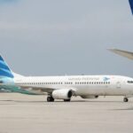 Pesawat Garuda Indonesia berada di area apron bandara. Sumber foto: Antara