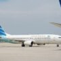 Pesawat Garuda Indonesia berada di area apron bandara. Sumber foto: Antara