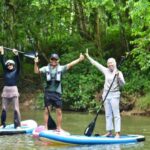 Kepala Kantor Wilayah Kemenham Provinsi Kaltim Umi Laila (kiri) bersama suami dan putrinya, di atas paddle board di SKM Samarinda setelah memungut sampah di sungai itu, Ahad (5/7). Foto Antara