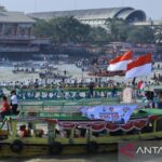 Peserta Festival Perahu Bidar berlaga di Sungai Musi, Palembang, Sumatera Selatan, dalam rangka memperingati HUT ke-81 RI Tahun 2026, Senin (17/8/2026). Sumber foto: Antara