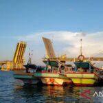 Kapal nelayan tengah bersandar. Sumber foto: Antara