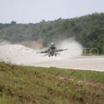 An F-16 fighter jet conducts a landing test on the Trans-Sumatra Toll Road in Lampung on Wednesday (February 11, 2026). Photo Source: Antara News Agency