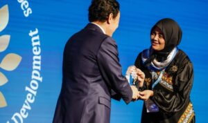 FAO Director-General Qu Dongyu presents the FAO 100 Women Heroes award to coffee farmer Istiqamah from Aceh, Indonesia, during the World Food Forum in Rome, Italy, on Thursday (October 15, 2026). Photo source: Antara News Agency