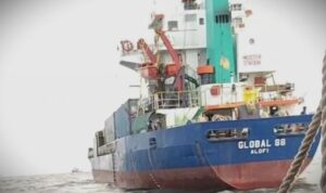 The Indonesian Navy is securing the cargo ship MV Global 88 in waters off Balikpapan after intercepting it off Majene, West Sulawesi. Photo Source: Antara News Agency
